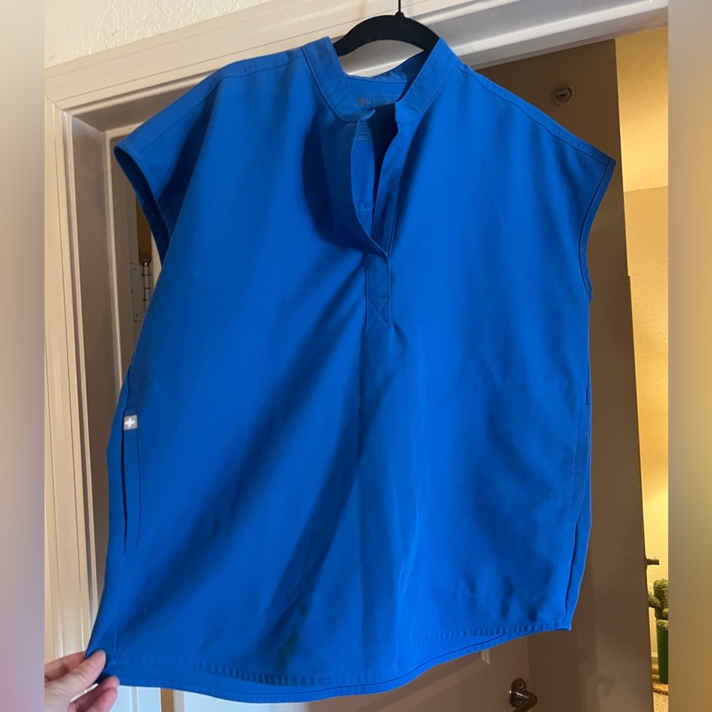 Royal Blue moderately worn Rafaela Figs scrub top size XS